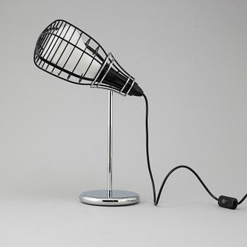 A 'Cage Mic' table light by Diesel for Foscarini.