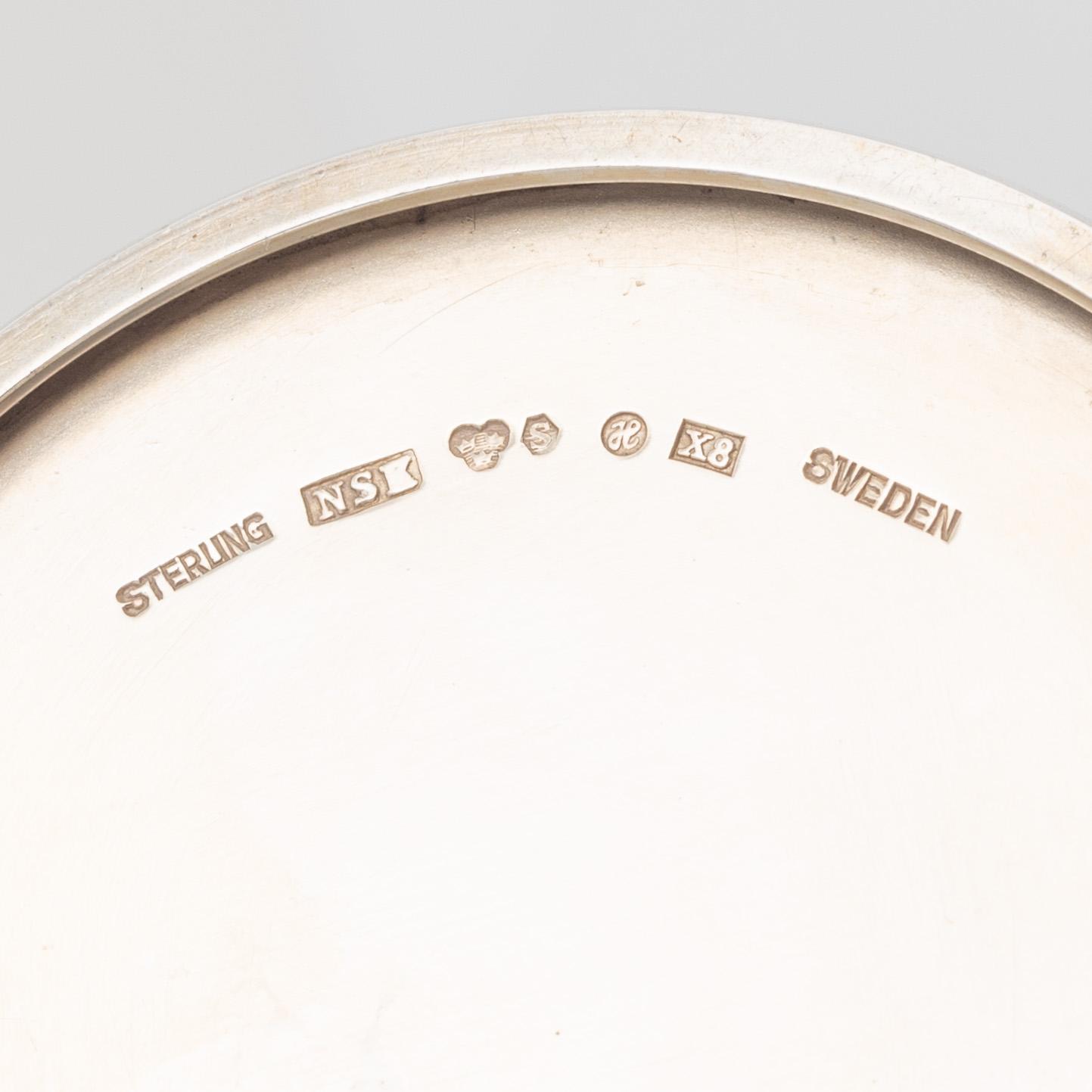 A three piece sterling silver coffee set, nordisk Silverkonst, Helsingborg, Sweden, 1948.