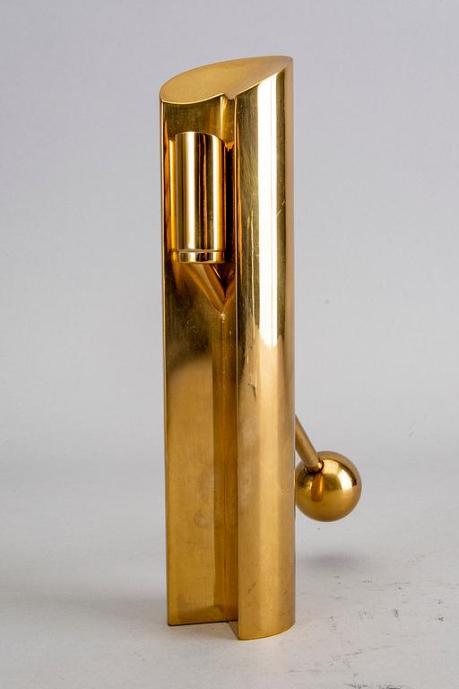 A Pierre Forssell brass candle stick for Skultuna.