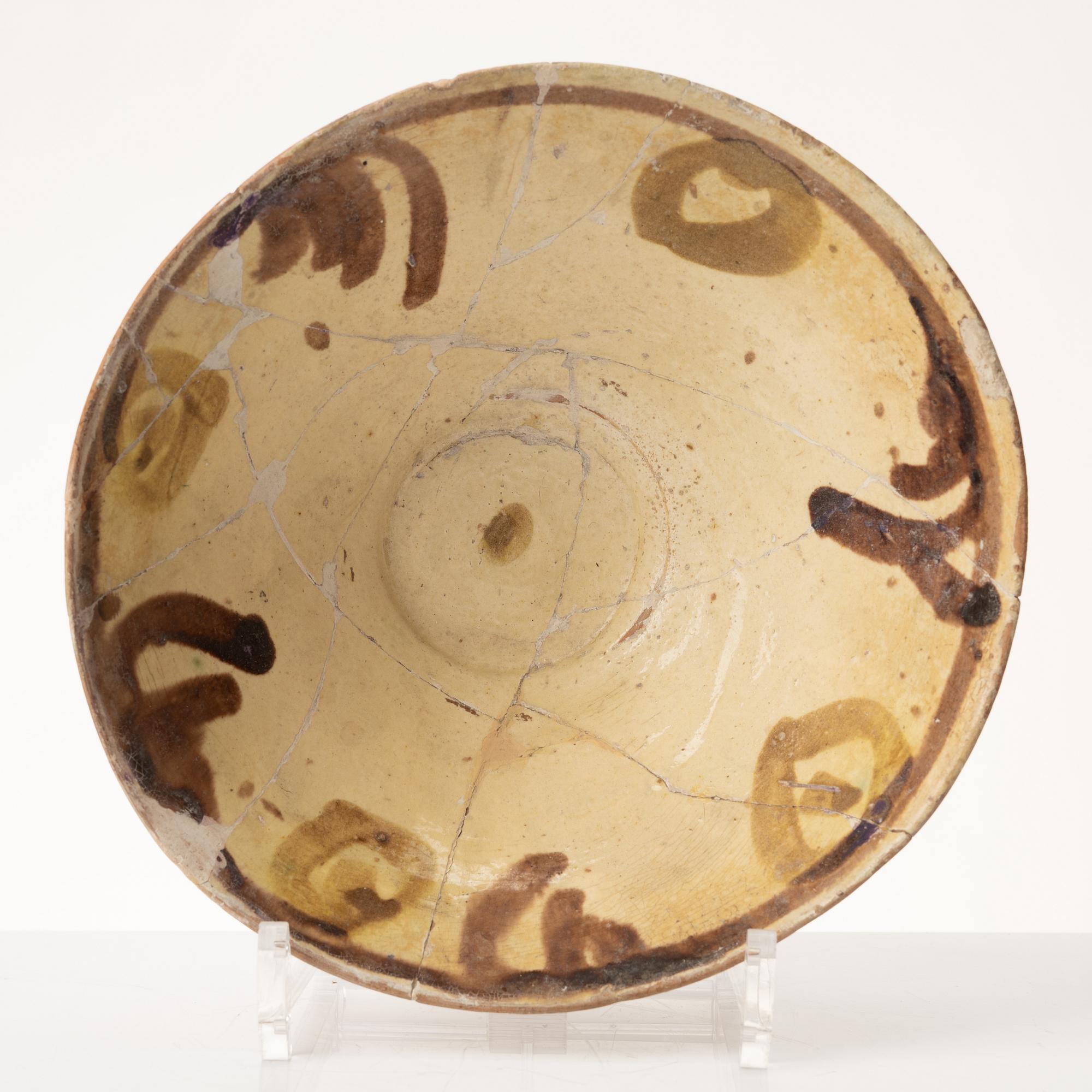 A glazed earthenware bowl, possibly Hispano-Moresque.