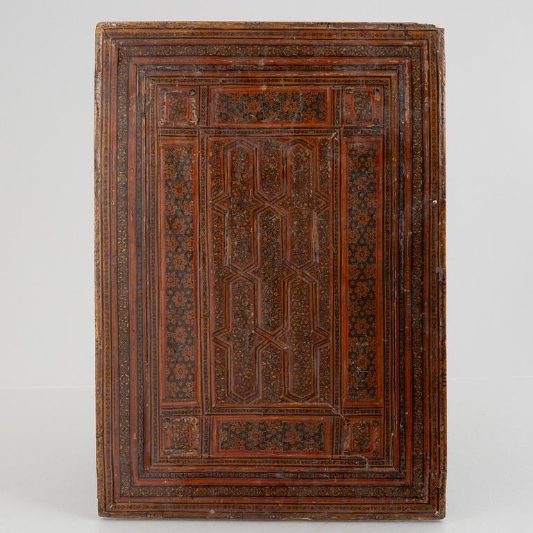 A Persian papier-maché mirror, first half of the 20th century.