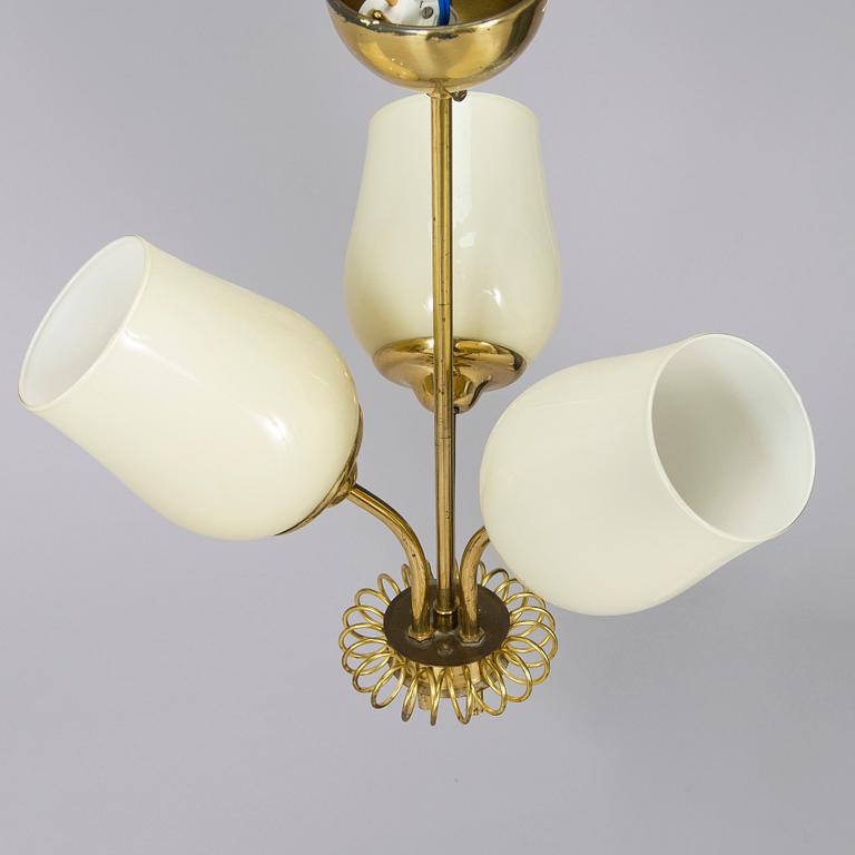 Kattovalaisin, Itsu, 1900-luvun puoliväli.