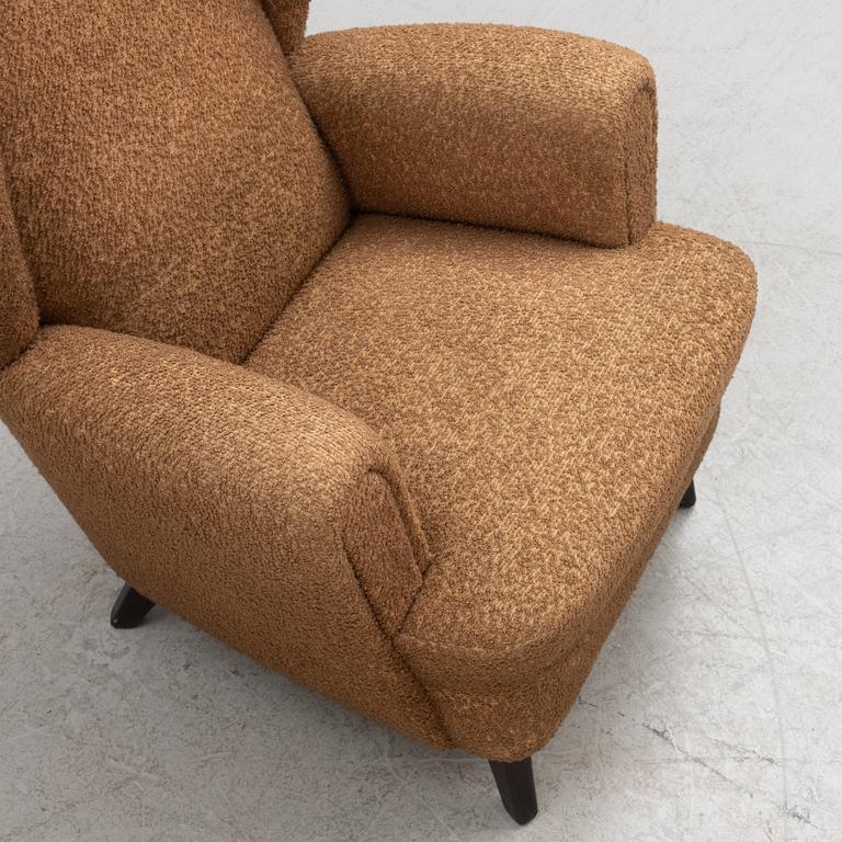 A wingback armchair, mid-20th Century.