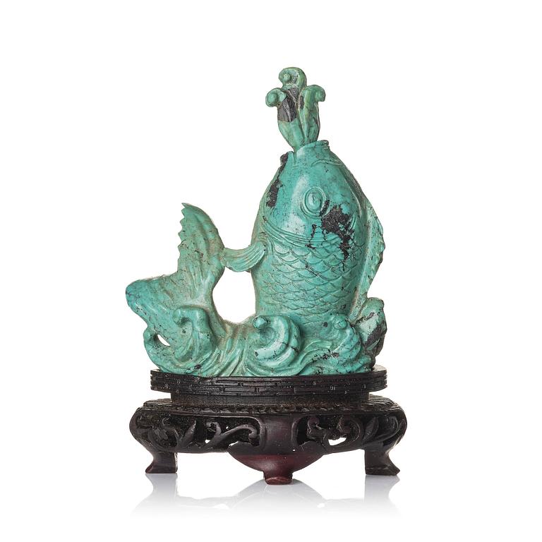 A well sculptured turquoise figure of a carp, Qing dynasty, 19th century.