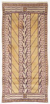 An Art Déco Pile Rug, 1930s. Circa 237 x 112 cm.