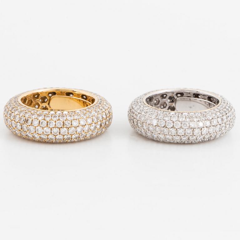Two brilliant-cut diamond rings.