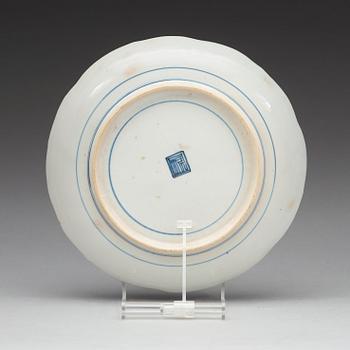 A set of eight blue and white Japanese dinner plates, 18th Century.