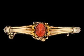 A carved coral cameo bracelet.