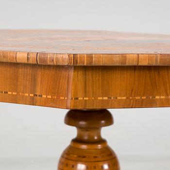 a neo rennaissance table from the late 1800's, possibly from Italy.