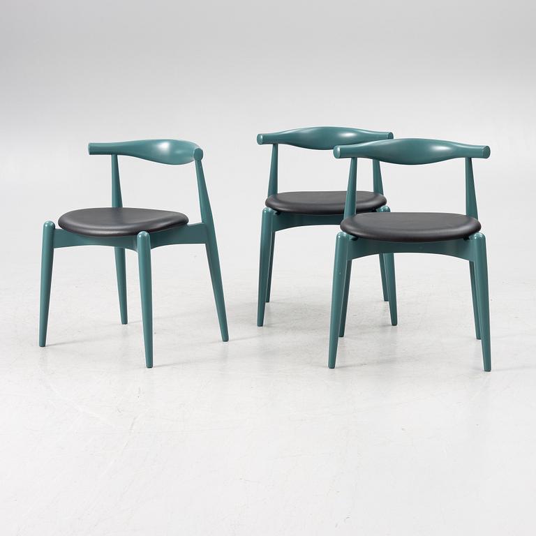 Hans J. Wegner, a set of three "CH-20" dining chairs, Carl Hansen & Son, Denmark 21st century.