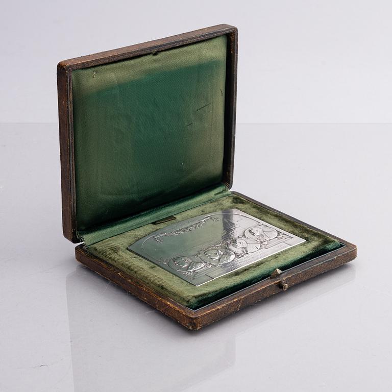 A Nobel commemorative silver plaque, marked Henri Varenne, Paris 1907.