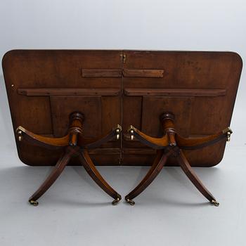 A mid 20th century English dining table.