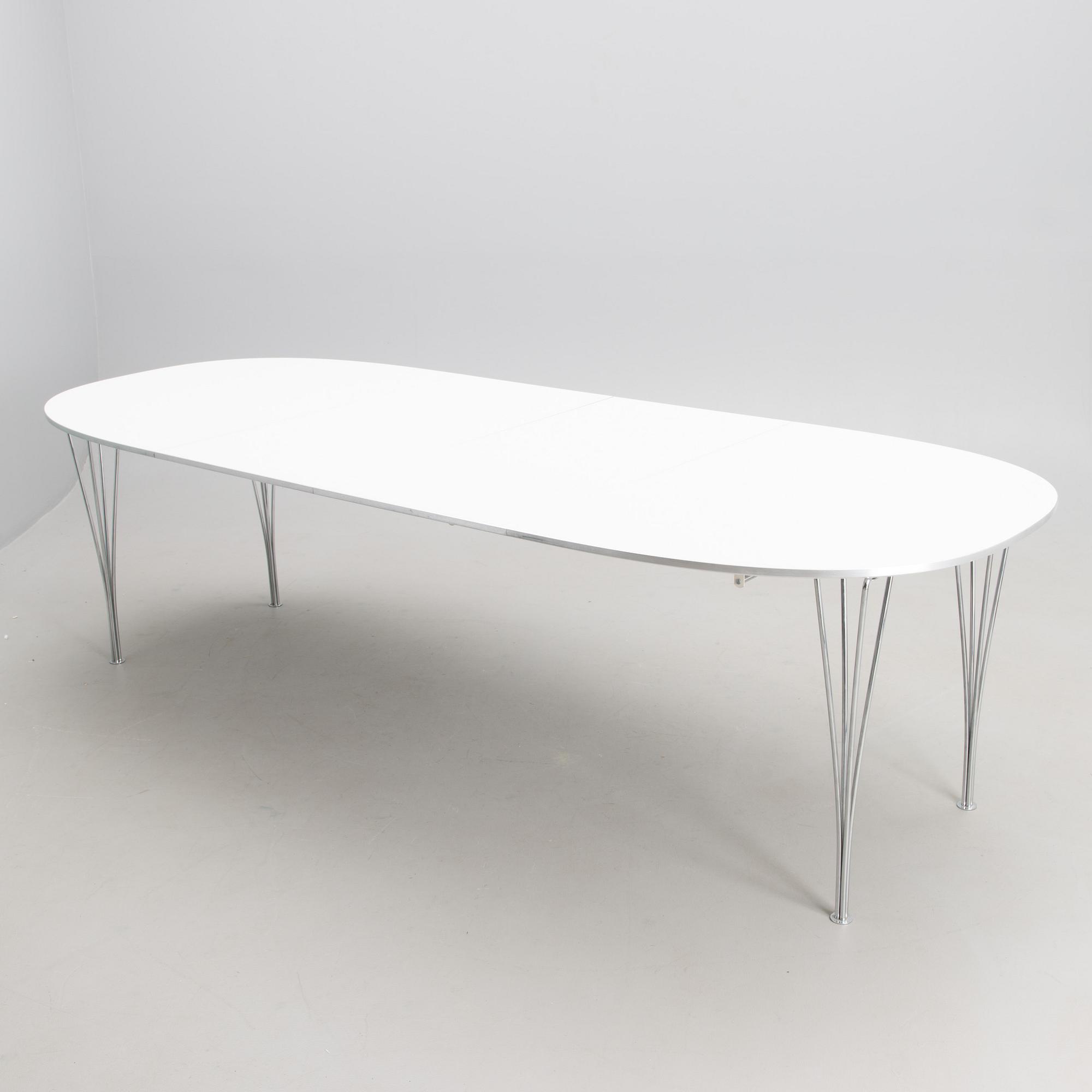 BRUNO MATHSSON AND PIET HEIN, a 'Superellips' dining table from Fritz Hansen, 1993.