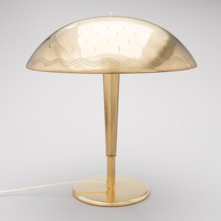 A mid-20th century table lamp model 5061 for Idman Finland.