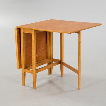 A gate-legged table by Edsbyverken in 1959.