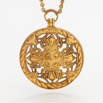 A gilded bronze neckalce "Åland pendant", model no. 67. Kalevala koru, Helsinki.