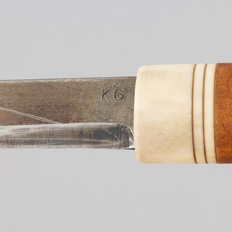 Per Anders Nutti, a reindeer antler knife, signed.