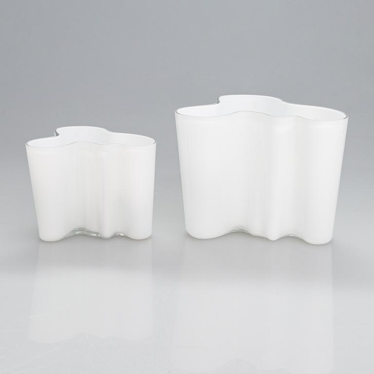 Alvar Aalto, two glass vases, the smaller one Iittala 100th Anniversary vase marked Alvar Aalto Iittala 1881-1981.