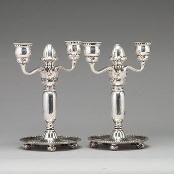 Georg Jensen, a pair of 830/1000 silver two light candelabra, Copenhagen 1918, model nr 93.