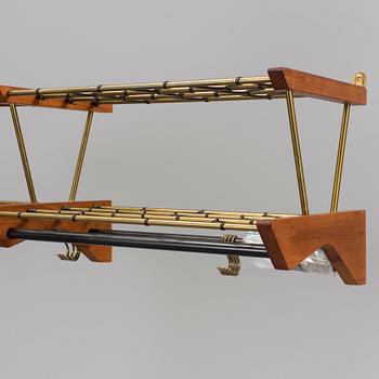 HATTHYLLA, mässing och teak, omkring 1900-talets mitt.