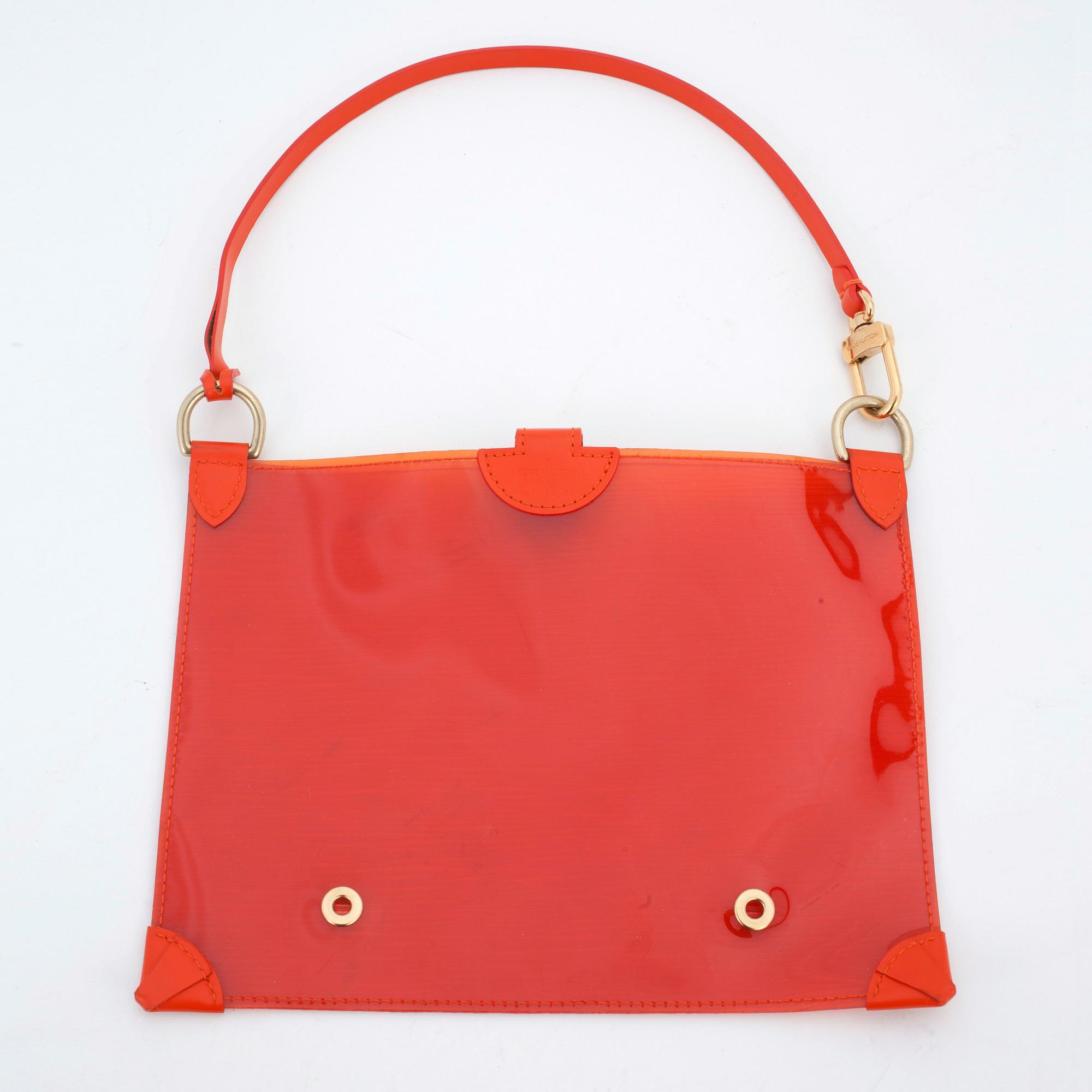 LOUIS VUITTON, a orange plastic pochette.