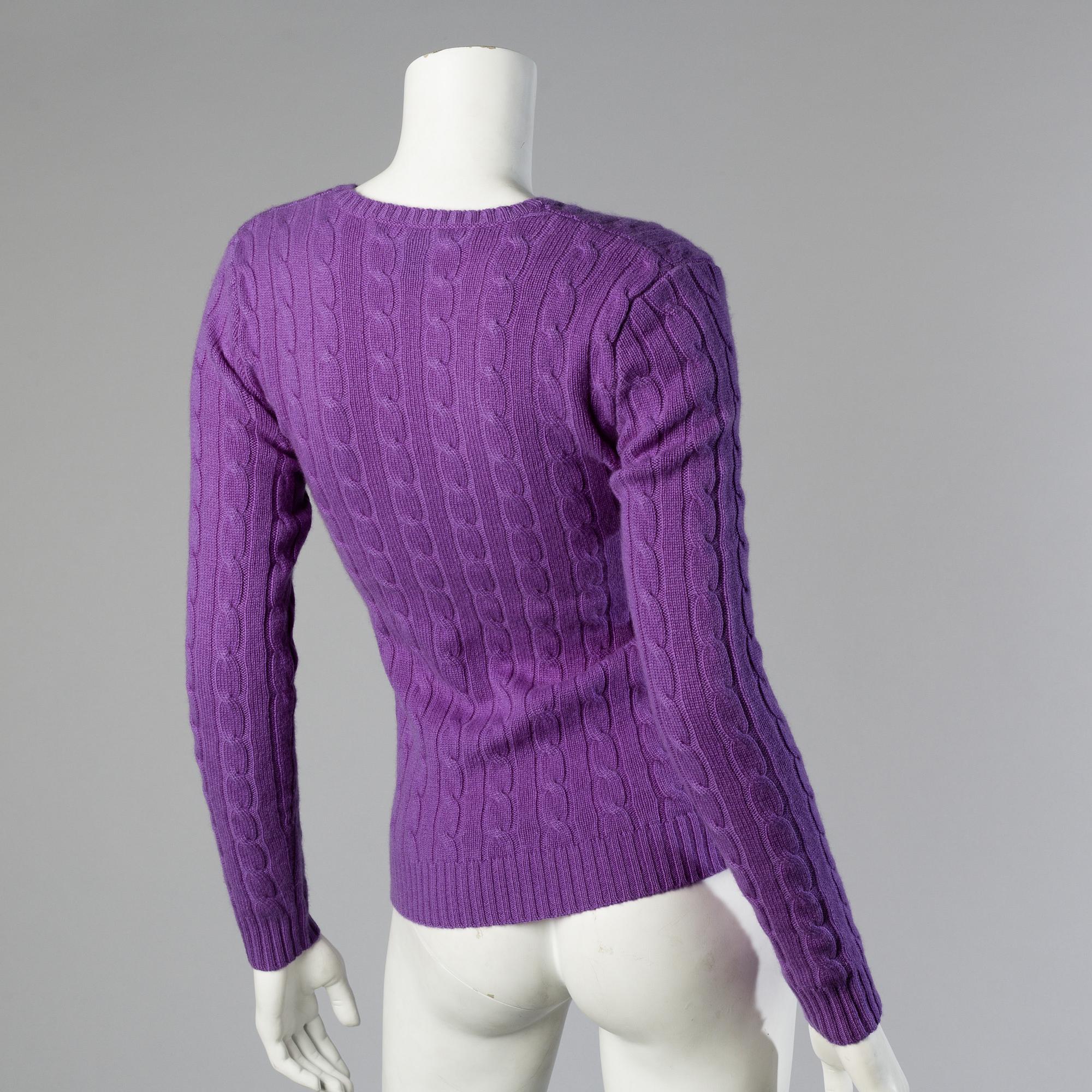 Three sweaters by Ralph Lauren.