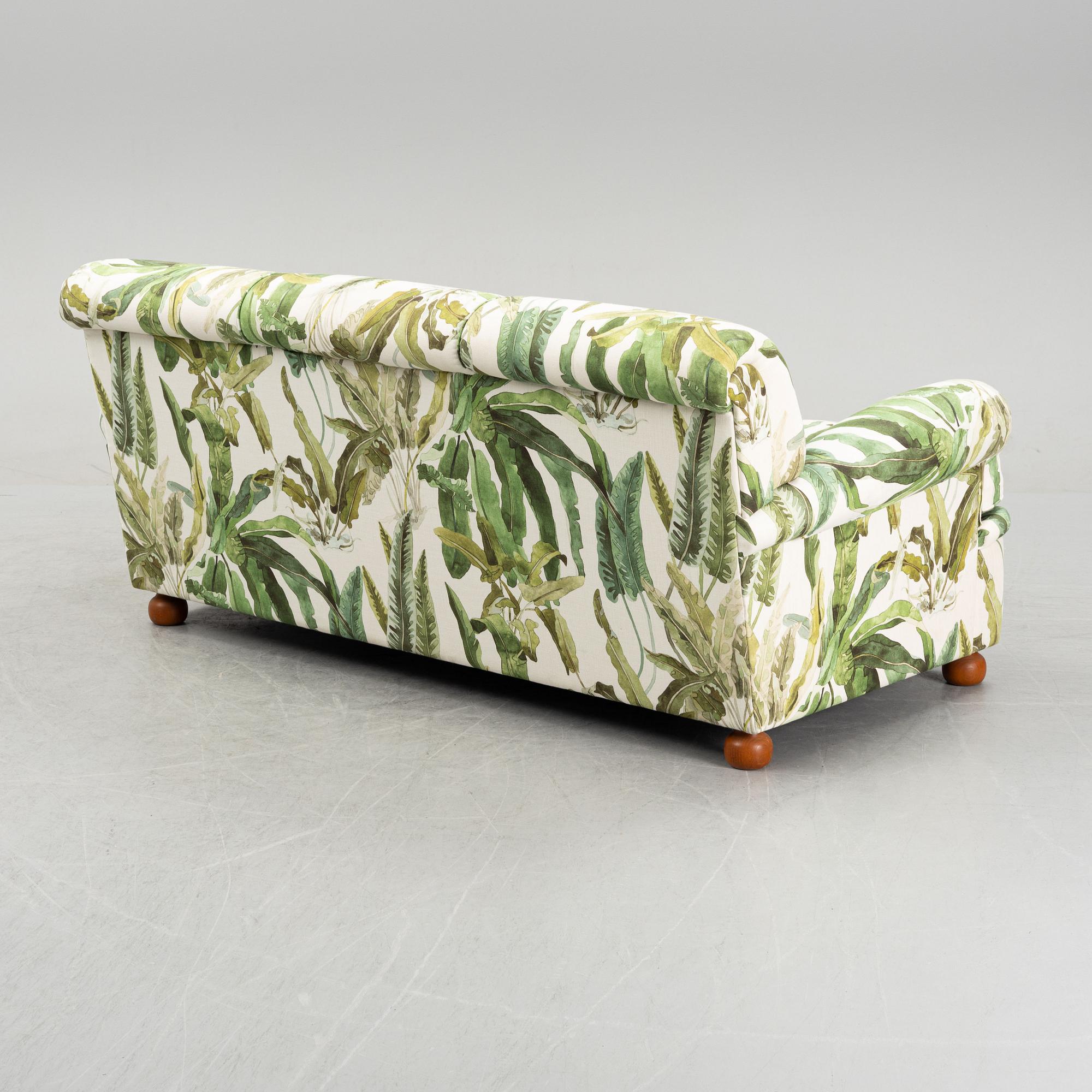 A model 703 sofa by Josef Frank for Firma Svenskt Tenn.
