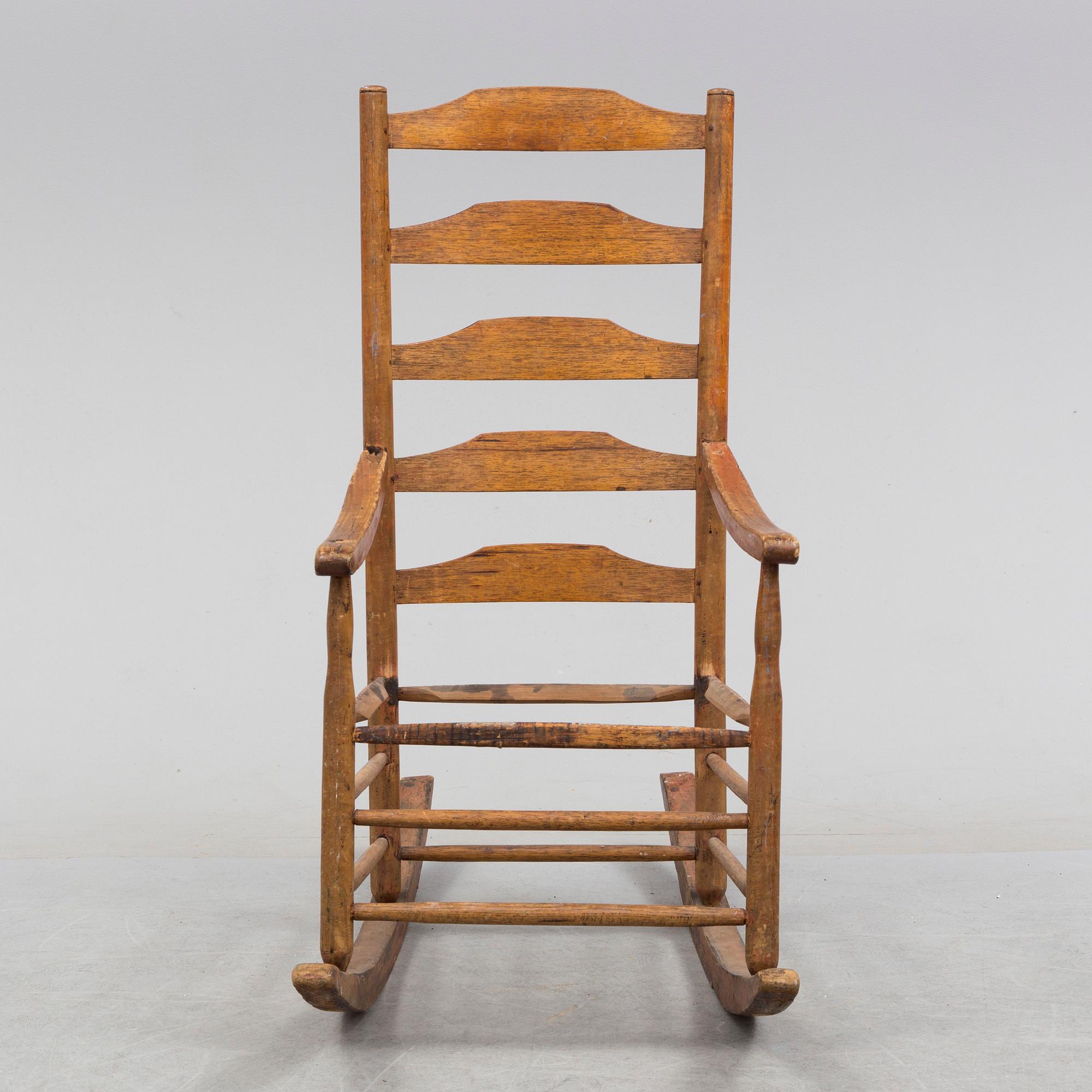 A 18th/19th century rocking chair.