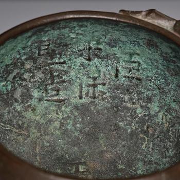 A peach shaped censer, Qing dynasty with an apocryphal Xuande mark.