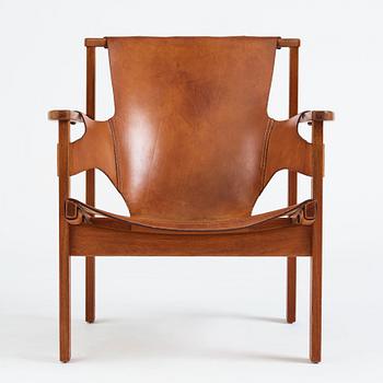 Carl-Axel Acking, a "Trienna" oak and natural leather easy chair, for Nordiska Kompaniet, Sweden 1960's.