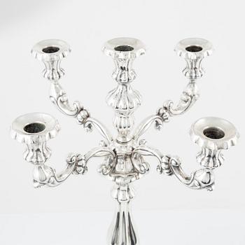 A pair of Austrian silver candelabra, unidentified makers mark, Vienna 1859.