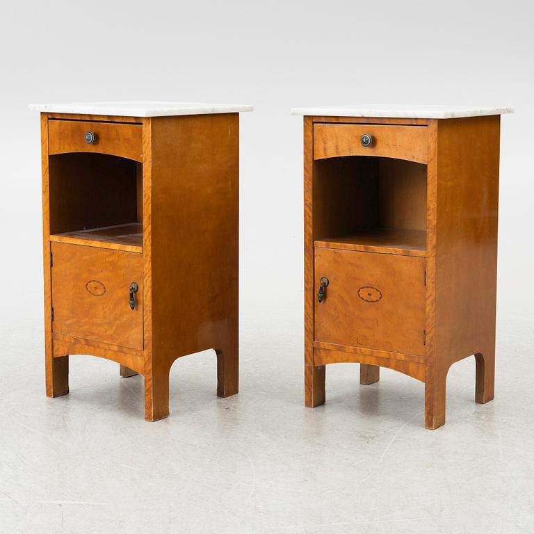 A pair of early 20th century bedside tables.
