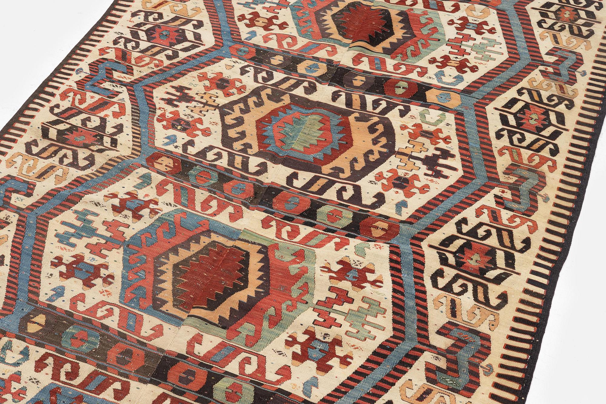 An antique central Anatolian kilim, possibly Konya, c. 339 x 140 cm.