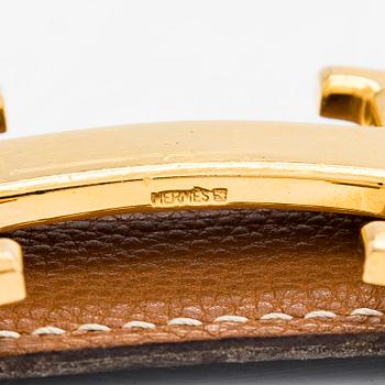 Hermès, a reversible leather 'Constance' belt, 2001.