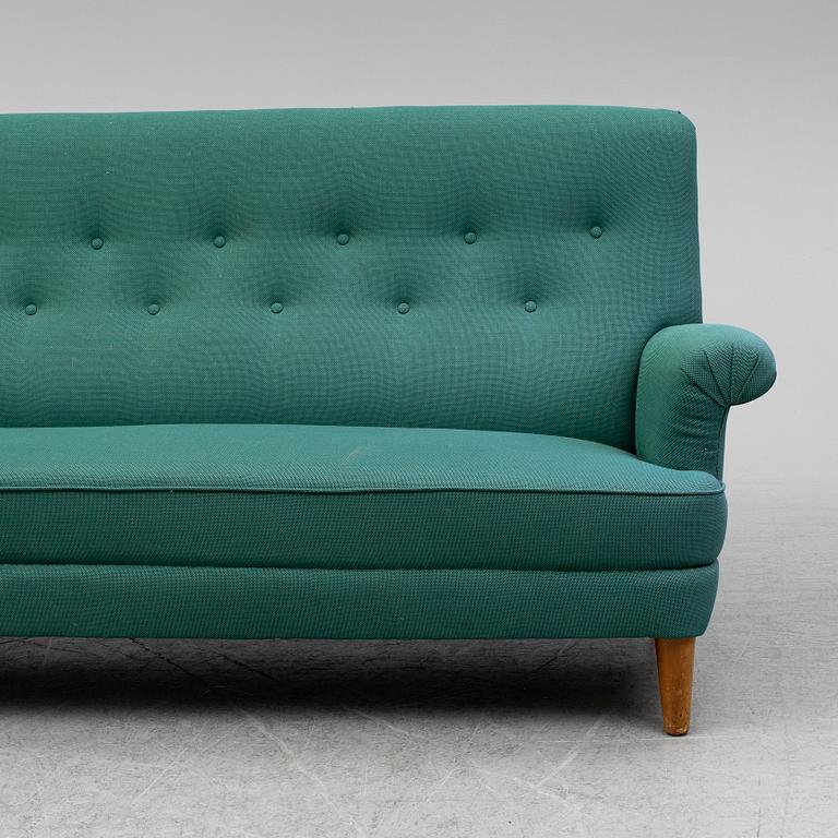 CARL MALMSTEN, a sofa.