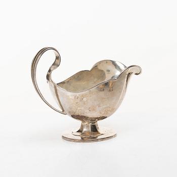 Sauceboat and four punch cups, silver, Sweden, 20th century.