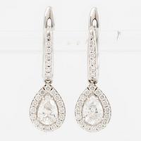 Earrings, a pair, 18K white gold set with pear-shaped and brilliant-cut diamonds.