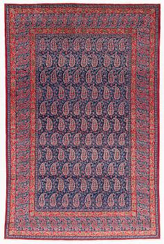 A semi-antique Qum rug, approx. 212 x 139 cm.