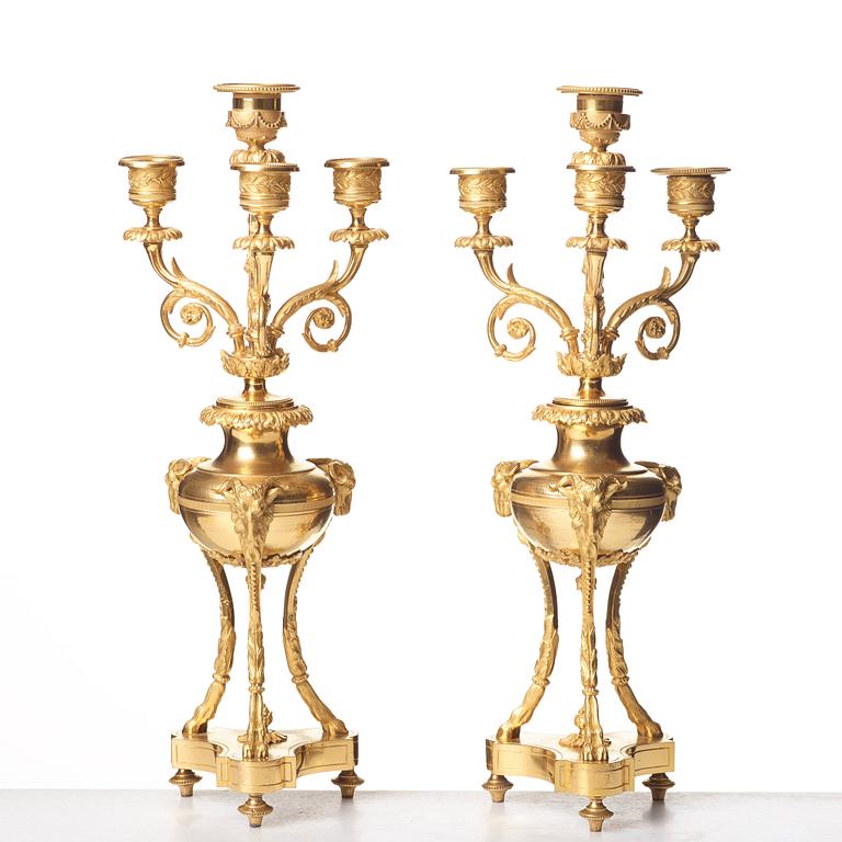 A pair of French Louis XVI-style four-light candelabra, second half of the 1800's.