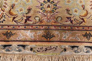 A carpet, Tabriz, with silk warp, c. 297 x 197 cm.