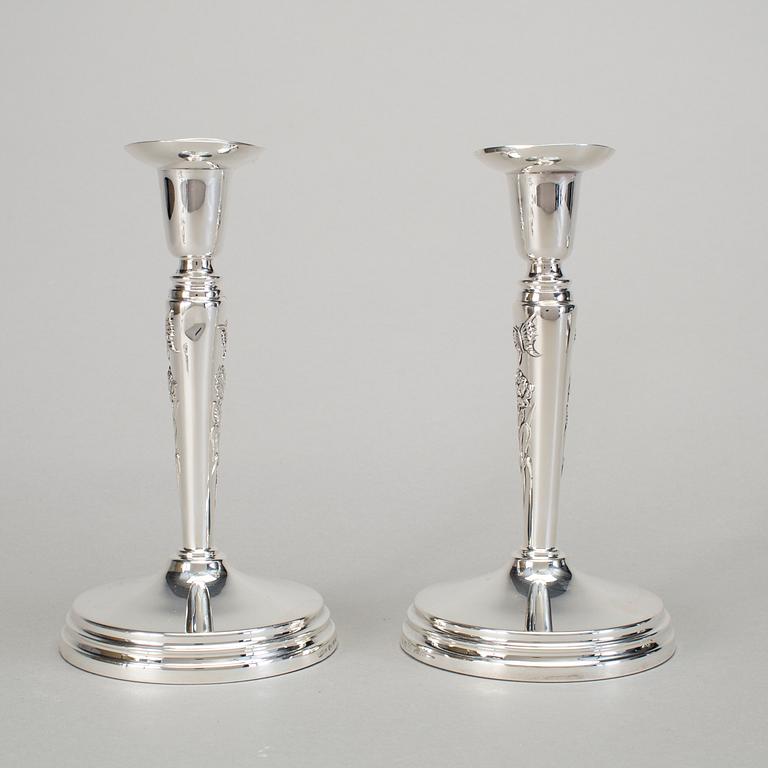 A pair of silver candlesticks by Meya Lerible for Mema, Linköping 1994.