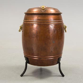 An early 20th century copper barrel.