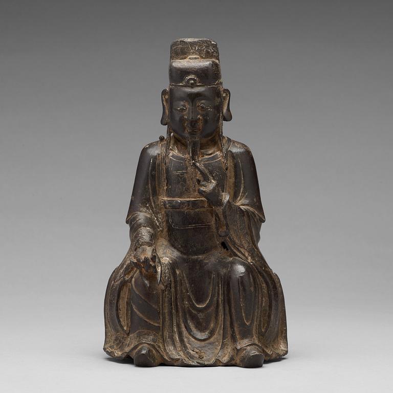 A bronze sculpture of a daoist dignitary, Ming dynasty (1368-1644).