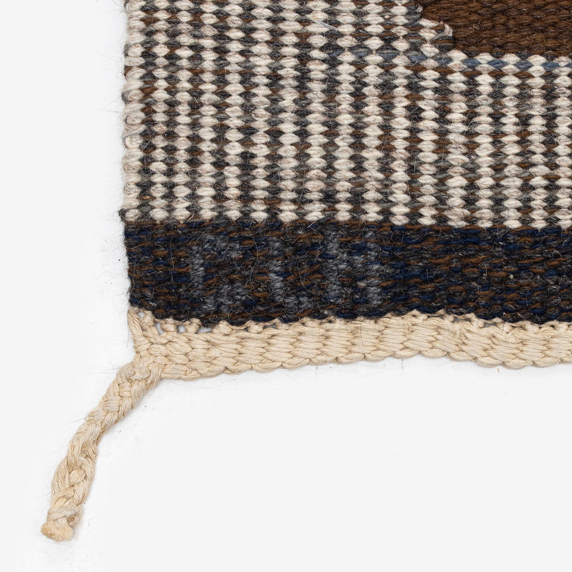 Margareta Grandin-Nettles, a flat weave carpet, c. 305 x 250 cm, signed GLH MG.
