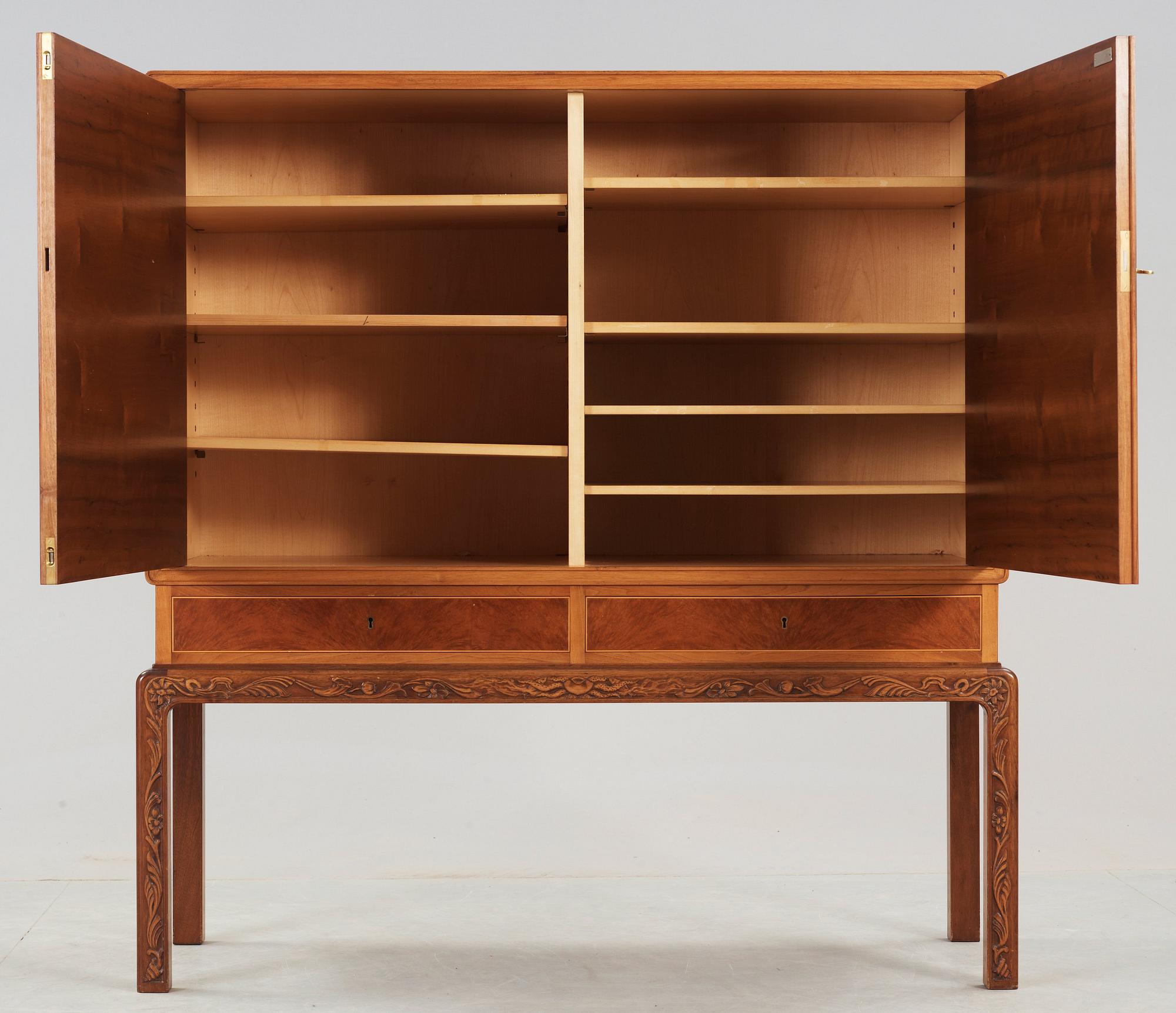 A Georg Johansson cabinet with inlays of several exotic woods, Gothenburg Sweden 1938.