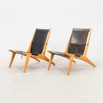 Östen Kristiansson armchairs, a pair of "Jaktstol/Vilstol 204" Luxus, Vittsjö, second half of the 20th century.