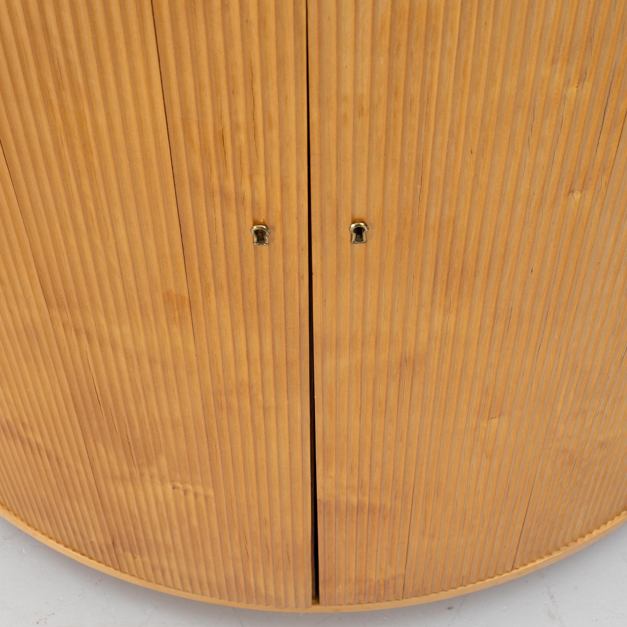 Corner cabinet, circa the mid-20th century.