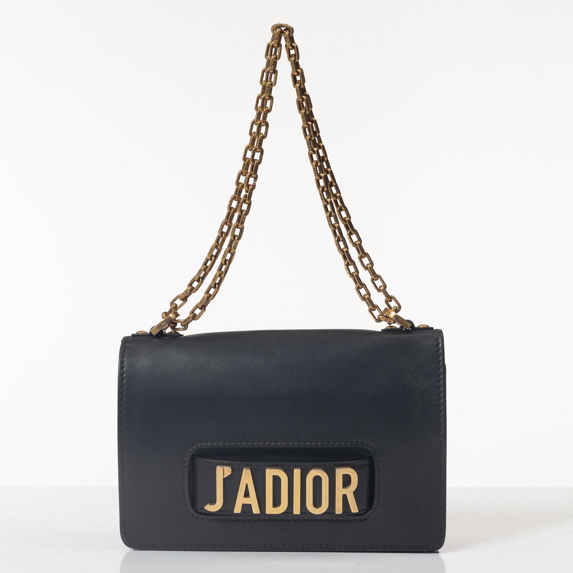 Christian Dior, A black leather "Dio(r)evolution" bag.