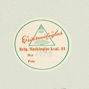 A SWEDISH MIRROR AND TABLE, oak and teak, signed with label "Eriksmåla glas". 1960s.