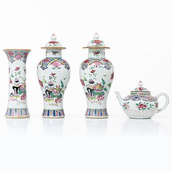 A FAmille Rose export porcelain teapot and a set of a vase and two urns, China, Qing dynasty, 18th century.